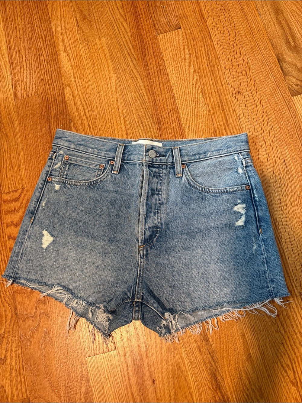Aritzia - Denim Forum Light Blue Distressed High-Rise Jean Shorts